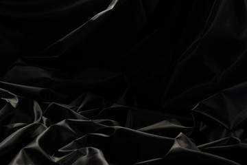 Wall Mural - Black cloth silk background with soft light