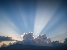 Clouds And Crepuscular Rays