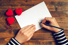 Woman Writing Love Letter For Valentines Day