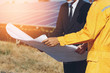 © weerajata - Engineer checking the solar panel