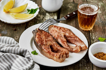 Wall Mural - Fried salmon steak in white plate. Healthy food style