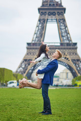 Poster - Romantic couple in Paris near the Eiffel tower