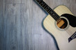 © Hyegyeong - Acoustic guitar on wooden background