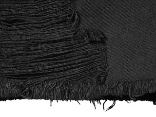 Wall Mural - Black torn denim textile for background