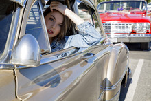 Beautiful Girl Driving Classic Car In Los Angeles