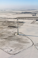 Wall Mural - aerial view of wind turbine on a field