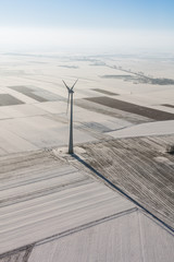 Wall Mural - aerial view of wind turbine on a field