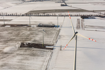 Wall Mural - aerial view of wind turbine on a field