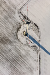 Wall Mural - aerial view of wind turbine on a field