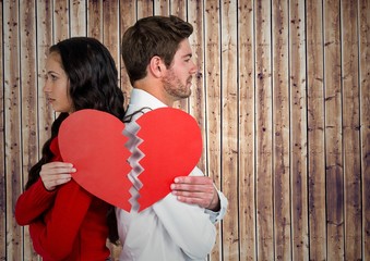 Canvas Print - Depressed couple holding broken heart