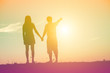 © chaunpis - silhouette of a man and woman holding hands with each other, wa