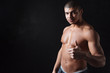 © Drobot Dean - Handsome young african sportsman with thumbs up gesture