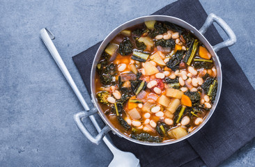 Vegetables soup with legumes top view.Traditional tuscany soup, ribollita.