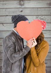 Poster - Romantic couple holding heart shape and kissing each other