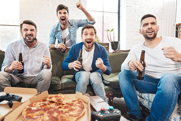 Wall Mural - Nice happy men supporting their football team