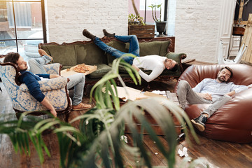 Wall Mural - Handsome attractive men sleeping in the living room