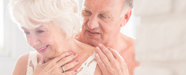 Wall Mural - Foreplay between senior man and woman