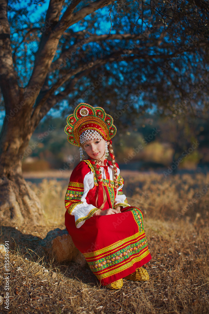 Small cute blonde girl in beautiful traditional Russian costume Stock Photo | Adobe Stock Small cute blonde girl in beautiful traditional Russian costume Stock Photo | Adobe Stock