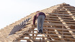 © schankz - workers working on the roof