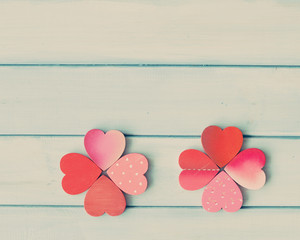 Wall Mural - Wood hearts forming a four-leaf clover