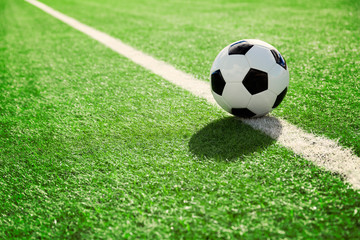  Traditional soccer ball on soccer field