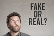 Man asking question for fake or real
