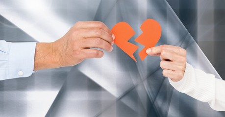 Wall Mural - Hand of couple holding red heart