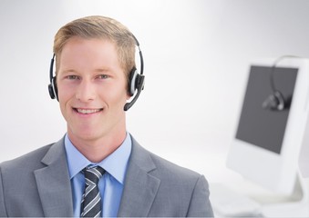 Portrait of smiling businessman with headset