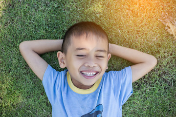 Wall Mural - Happy boy child is smiling enjoying adopted life. Portra