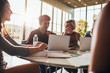 © Jacob Lund - Group of university students doing research on internet