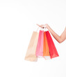 © sopradit - women holding shopping bags in her hand with a copy space,isolated on white background