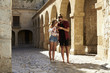 © Monkey Business - A couple sightseeing in Ibiza using a phone for guidance