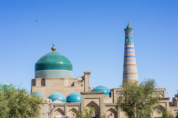 Wall Mural - Islam Khoja (Khodja) Minaret in Itchan Kala, the walled inner town of the city of Khiva, Uzbekistan. UNESCO World Heritage