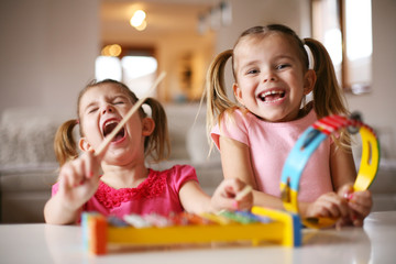 Two little girl at music school.