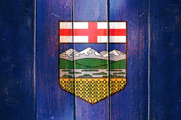 Wall Mural - Vintage Alberta flag on grunge wooden panel