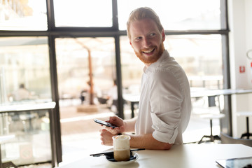 Sticker - Busy businessman enjoying coffee while online