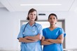 © WavebreakMediaMicro - Portrait of nurse and doctor standing with arms crossed