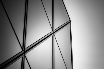 windows of commercial building in Hong Kong with B&W color
