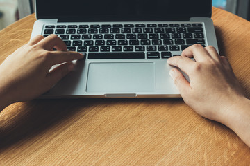 Hands typing  on notebook computer