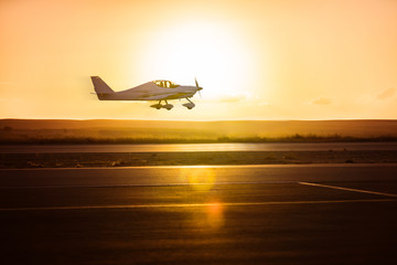 small plane on the runway