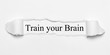 © magele-picture - Train your Brain on white torn paper