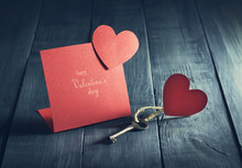Valentine's Day Card With A Key And Paper Hearts.