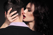 fashion studio photo of lovely impassioned couple in elegant out