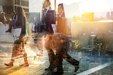 Canvas Print - Silhouettes of business people walking in London against of sunset. Multiple exposure image. Business concept illustration.