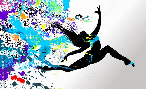 Fototapeta na wymiar Beautiful dancing girl in bright multicolored splatters. 