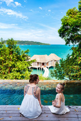 Poster - Mother and daughter at resort