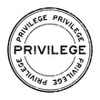 Grunge black privilege round rubber stamp on white background