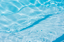 Blue Swimming Pool Background. Summer And Water Concept