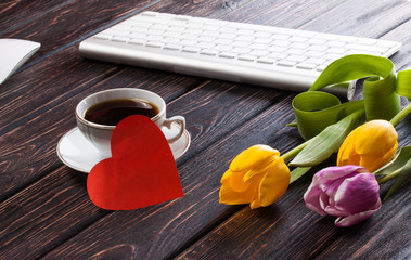 Poster - Colored fresh tulip on wood desk