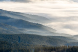 Fototapeta Do pokoju - misty mountains on ski resort